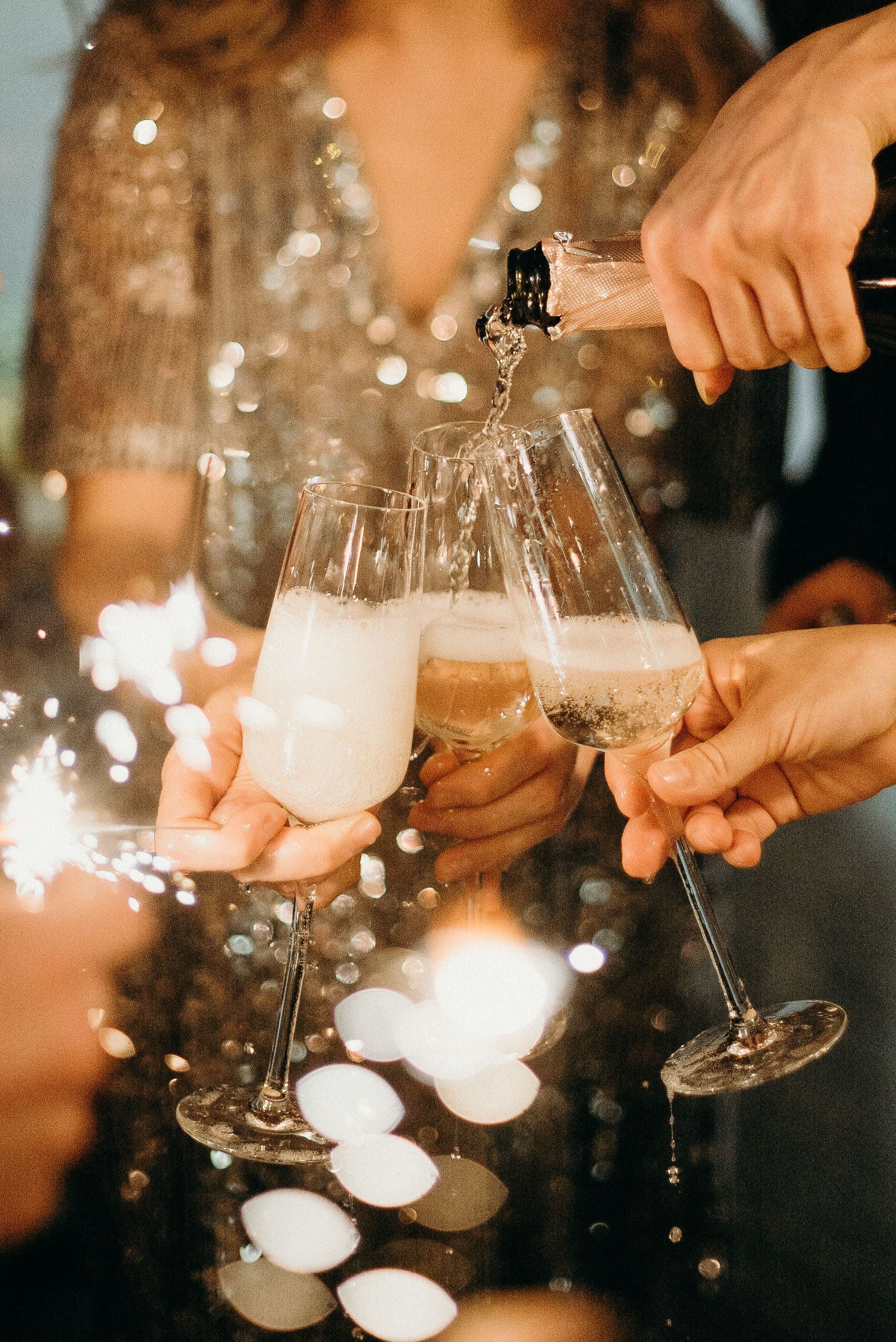 A champagne pour at a venue celebration.