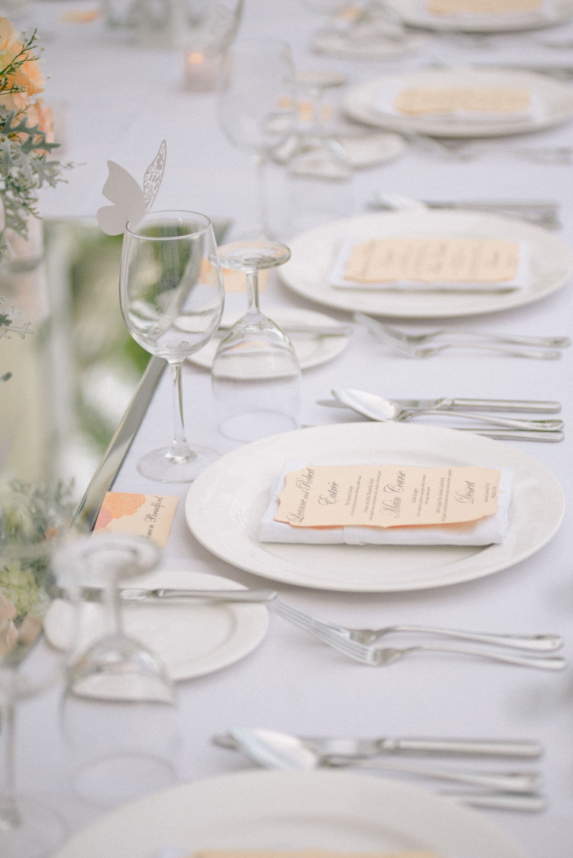 An elegant place setting at a wedding reception.